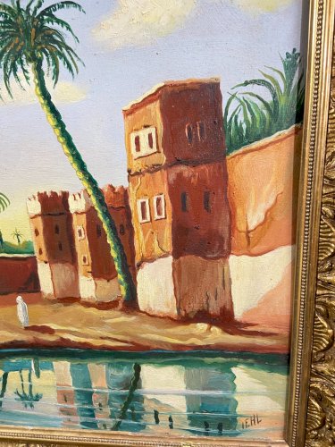Tableau orientaliste représentant une vue animée d'une oasis palmiers Sud Maroc