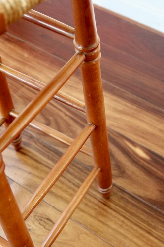 Tabouret de bar ancien en bois et assise paillée