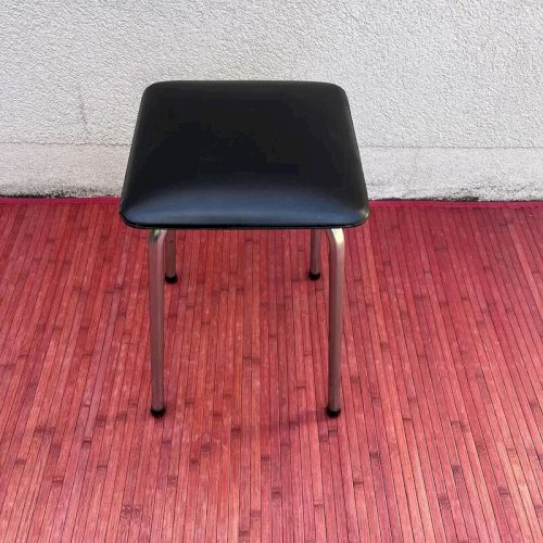 Tabouret vintage en skaï noir
