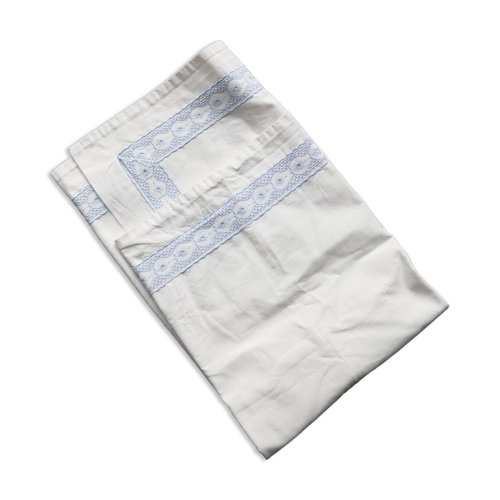 Taie d’oreiller vintage brodée fil bleu clair