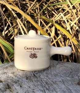 Retro vintage coffee cup with lid