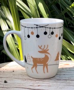 White mug with Christmas decorations