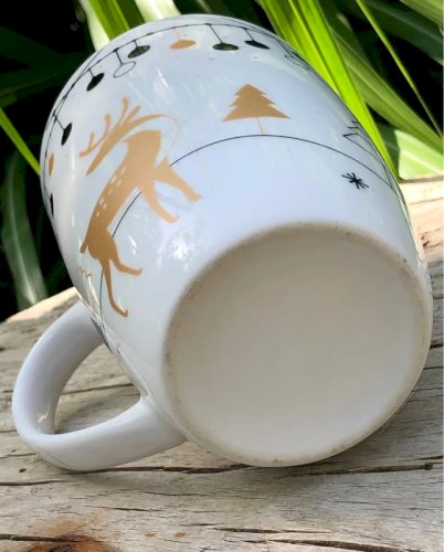 Tasse blanche aux décors de Noël