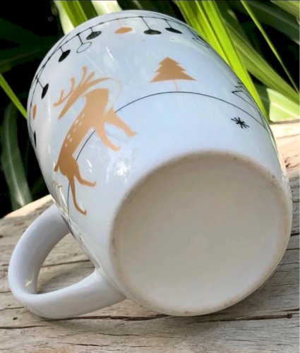 Tasse blanche aux décors de Noël