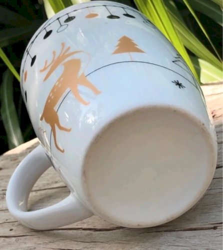 Tasse blanche aux décors de Noël