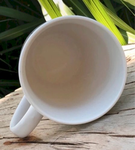 Tasse blanche aux décors de Noël