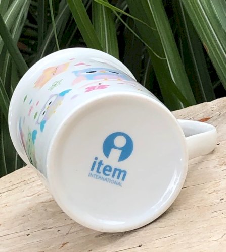 Tasse en porcelaine motifs hiboux couleurs pastels