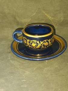 cup and saucer signed Terra Hellas sterling gold in good condition
