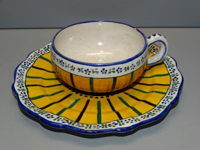 -CUP AND SAUCER ALFRED RENOLEAU AR.A CERAMIC DISPLAY COLLECTION D