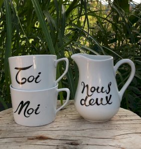 Cups You and Me and cream pitcher Us Two in white porcelain