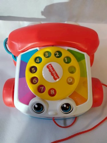 Téléphone a tirer Fisher Price en bon état
