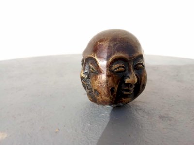 Tête de Bouddha à quatre faces en bronze