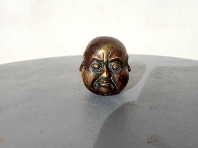 Tête de Bouddha à quatre faces en bronze