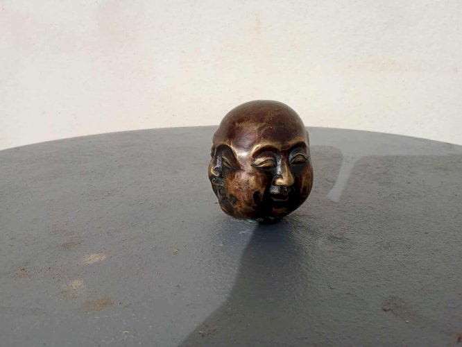 Tête de Bouddha à quatre faces en bronze