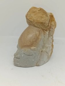 Tête en pierre taille sculpter dorigine africaine en bon état
