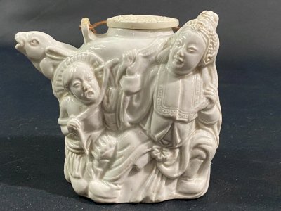 White porcelain teapot Dehua China 19th century with zoomorphic spout & character decoration