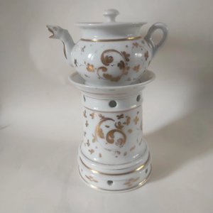 Antique teapot made of old Paris porcelain.
