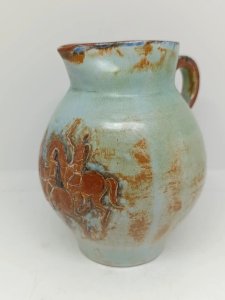 Very beautiful pitcher with a rider decoration signed BG? to be identified in good condition.