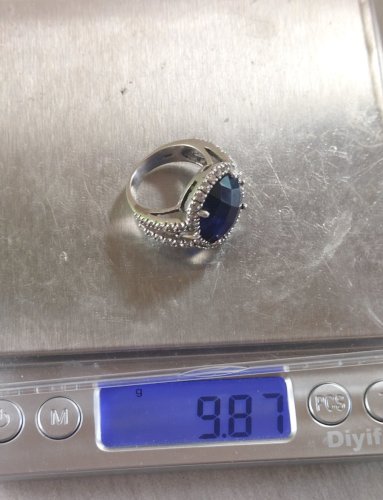 Très belle bague Halo, pierre bleue, en argent massif