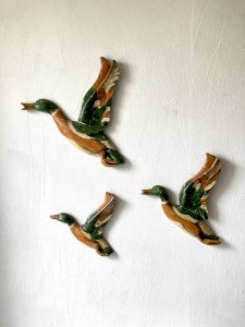 Wooden carved and painted trio of mallard ducks, wall decoration