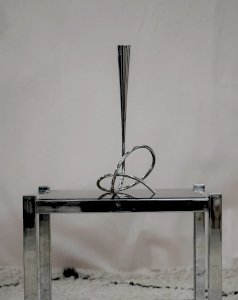 Ulysses, the large metal candlestick No. 58