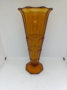 Art deco vase in amber color made of pressed molded glass, in good condition.