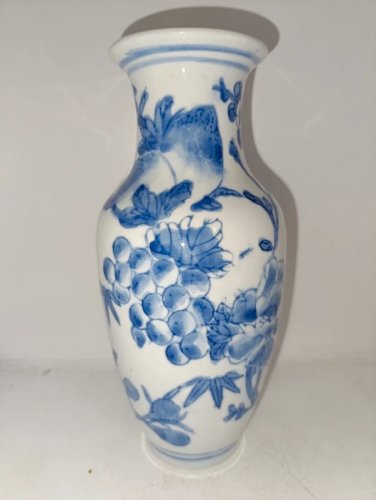 Vase chinois en porcelaine a décor floral en bon état