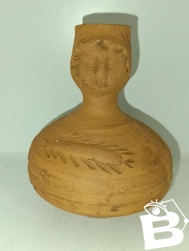 vase dans le gout des productions gallo romain anthropomorphe en bon etat