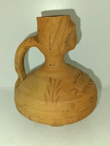 vase dans le gout des productions gallo romain anthropomorphe en bon etat