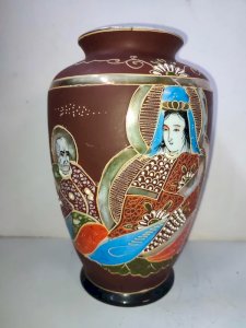 Japanese Satsuma vase with character decoration in good condition.