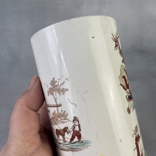 Vase rouleau ou pot divers faience Lunéville décor humoristique "Granville"