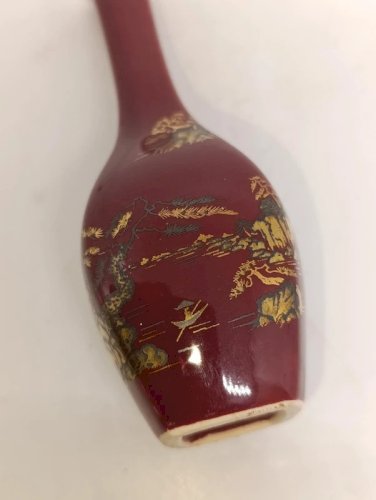 vase soliflore bordeaux dorigine asiatique à decor floral en bon etat