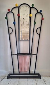 Vintage wooden and metal coat rack, antique coat stand for entrance.