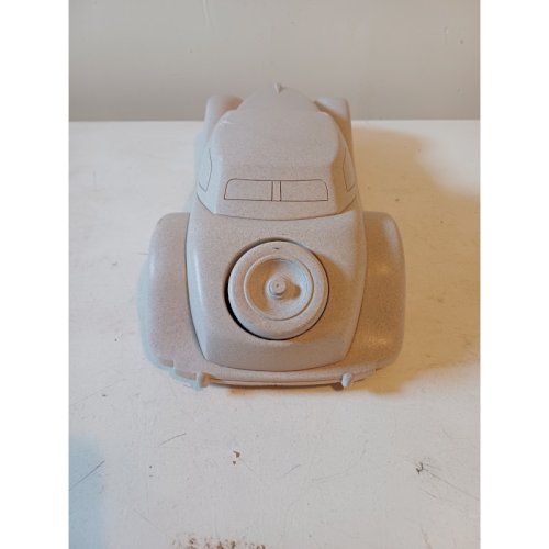 Voiture  Jaguar  en Pierre , travail de Compagnon .