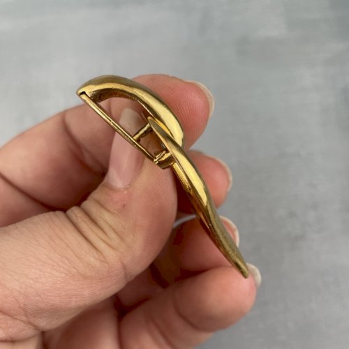 YSL Yves Saint Laurent pendentif coeur doré bijou de luxe vintage intemporel